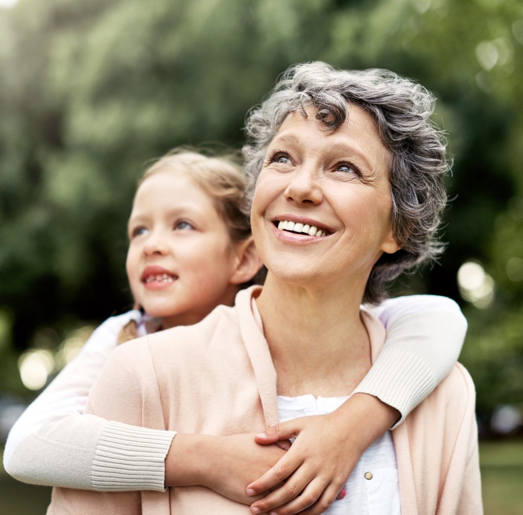 Cropped shot of a little girl bonding with her grandmother at the park